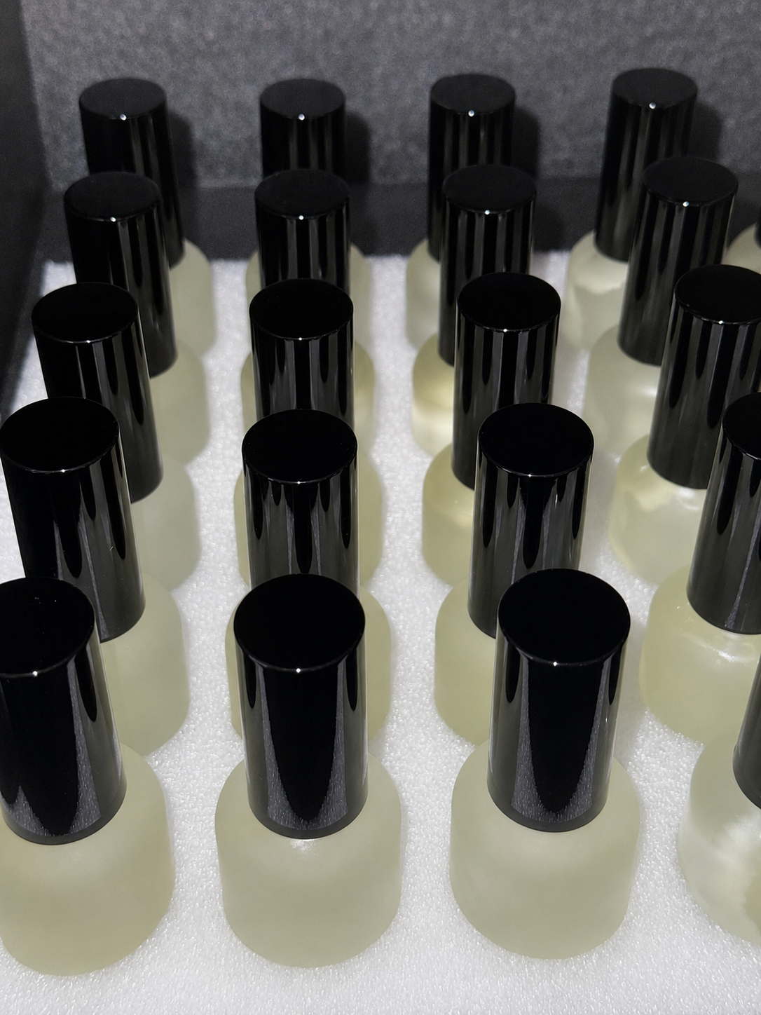 Filled frosted fragrance bottles