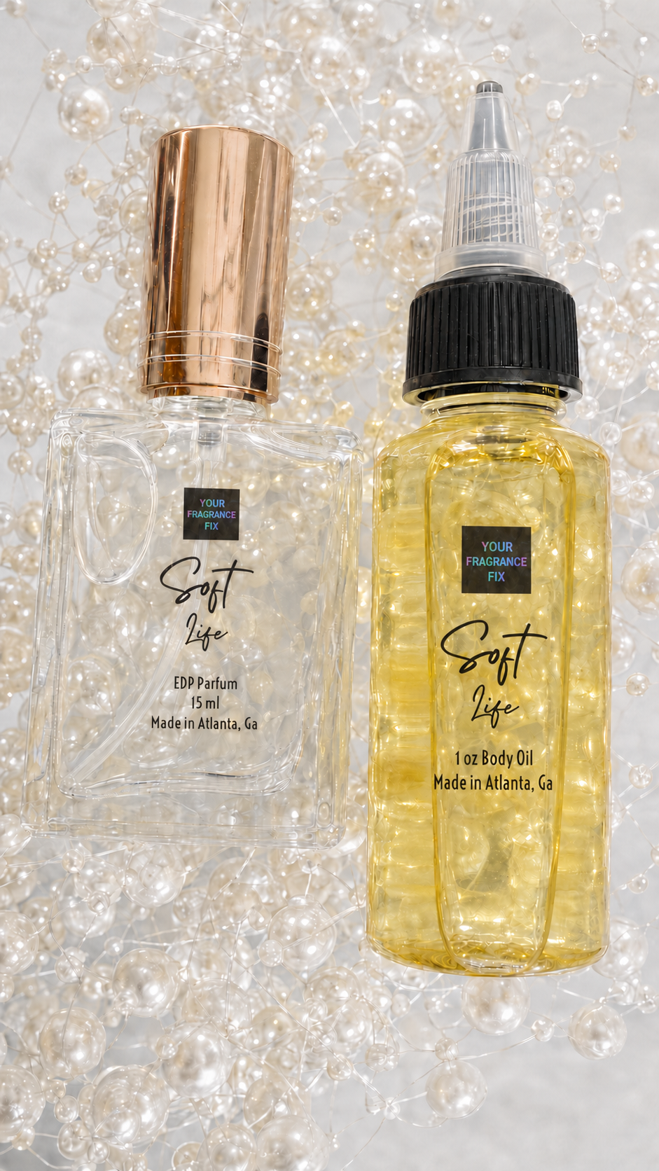 Soft Life perfume and body oil styled with luminous pearls